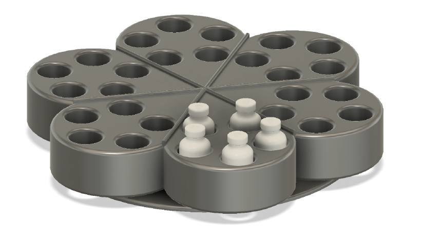 Proposed redesign of the rotating rack with five-vial cassette holders arranged radially, matching the lidocaine manufacturer's five-vial packaging cassettes.